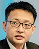 Portrait of Bernard Wee, Executive Director, Financial Markets Development and Payments & Technology Solutions, Monetary Authority of Singapore (MAS)
