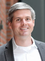 Portrait of Jon Paquette, VP Customer Success, US, TIS