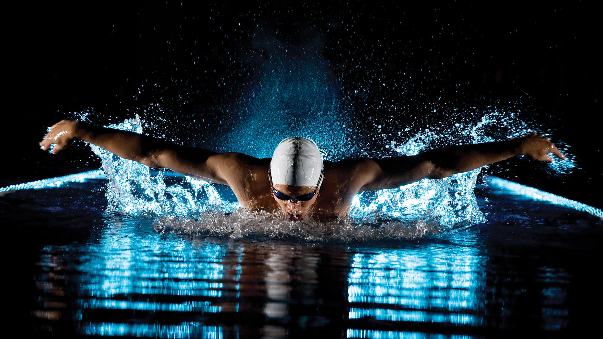 Swimmer taking breath whilst swimming