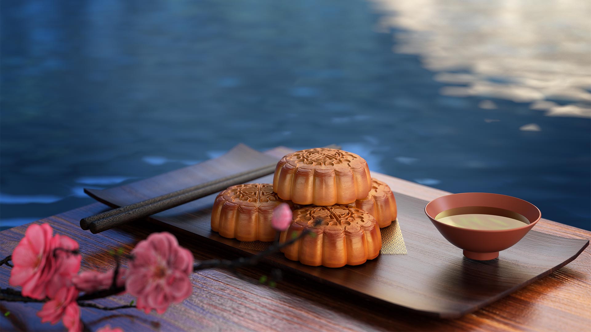 Chinese moon cakes with water in the background