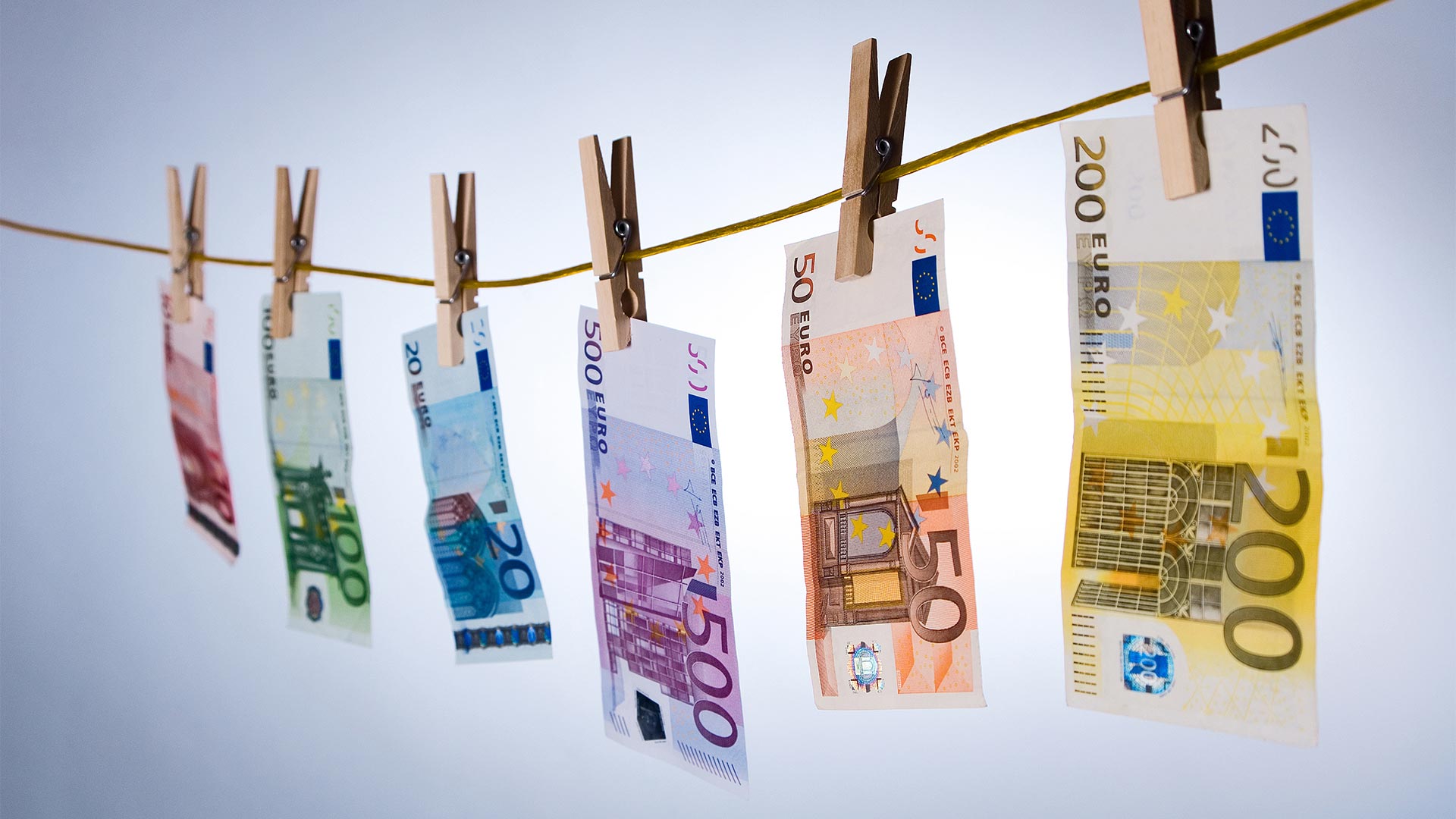 Euro notes pegged to a washing line