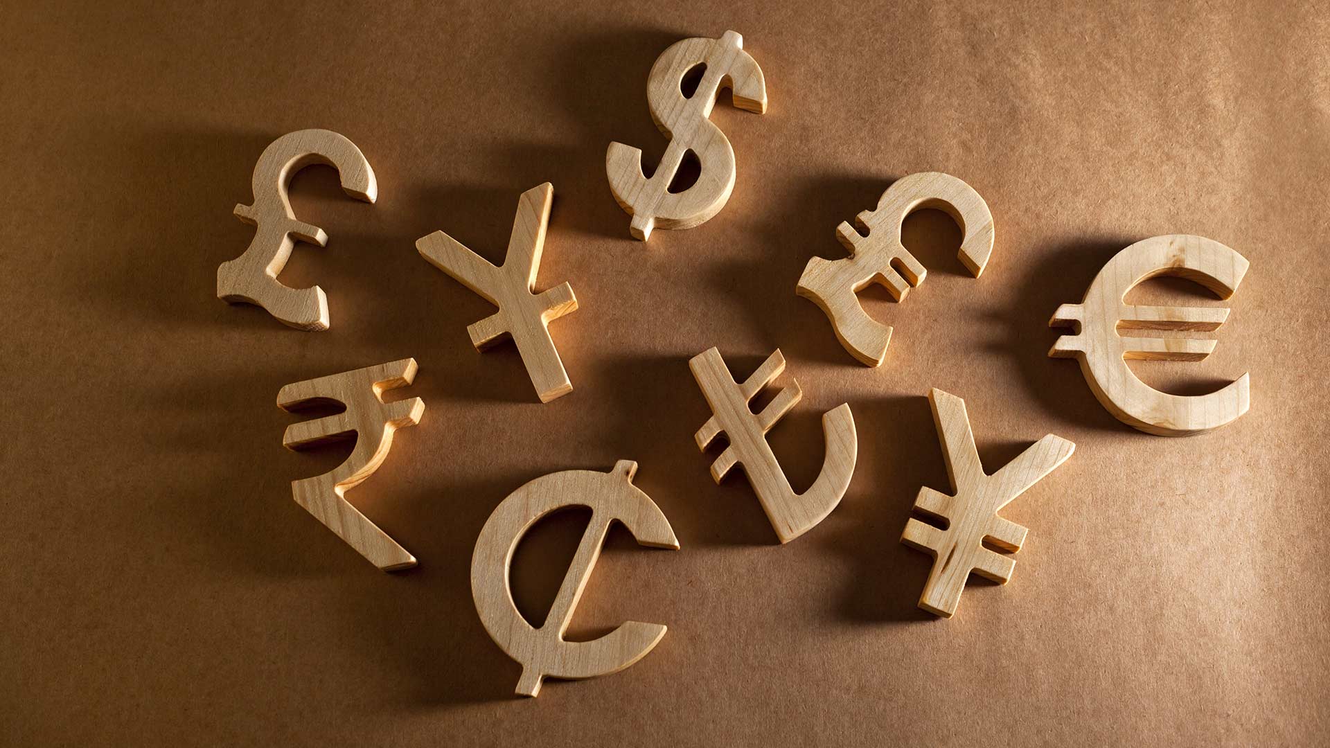 wooden currency figures