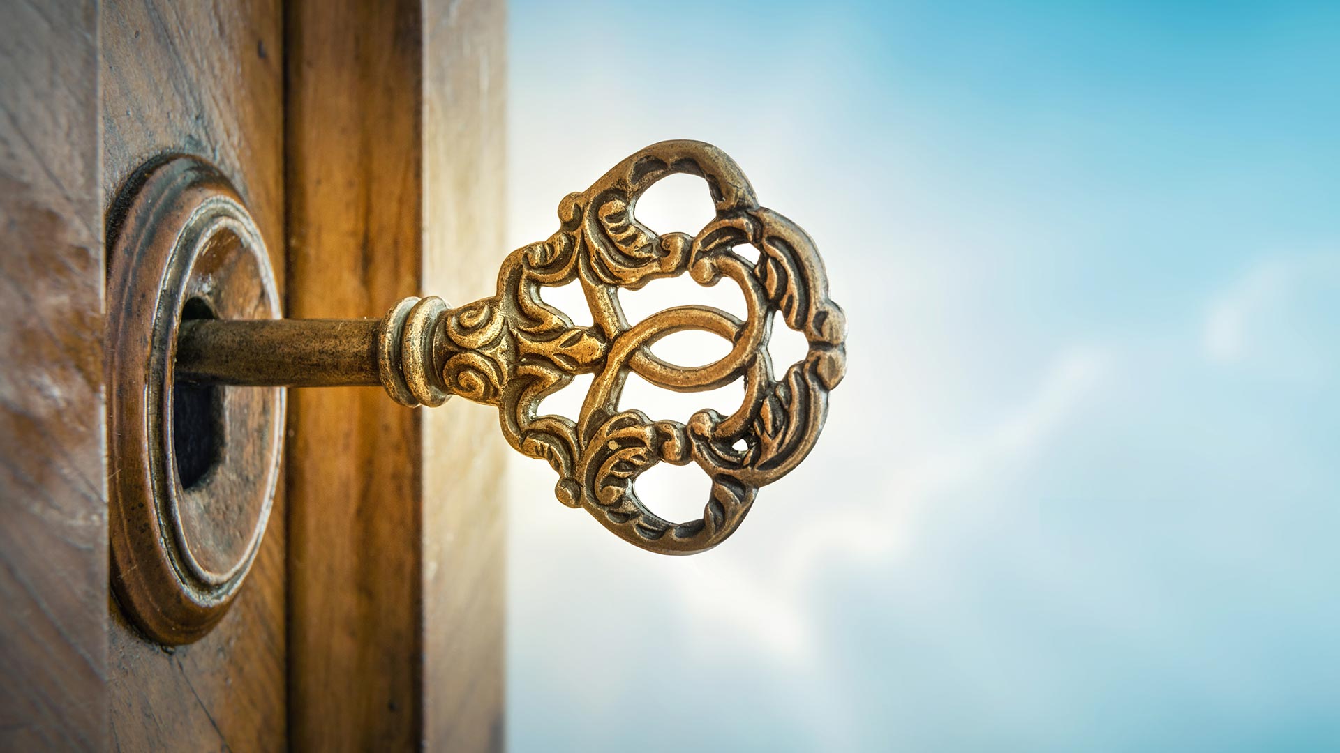 Old fashioned key in a door lock