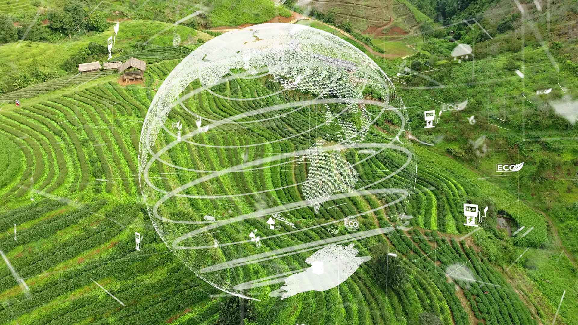 Technology globe overlayed on green fields
