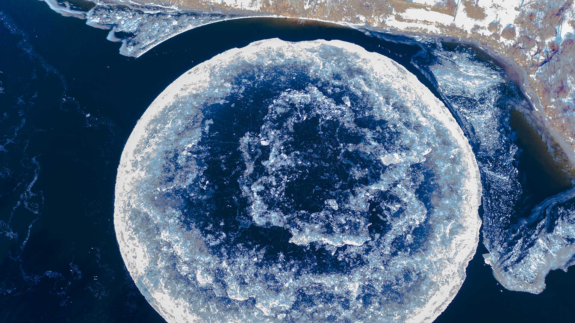 Big frozen ice disk in Westbrook Maine River