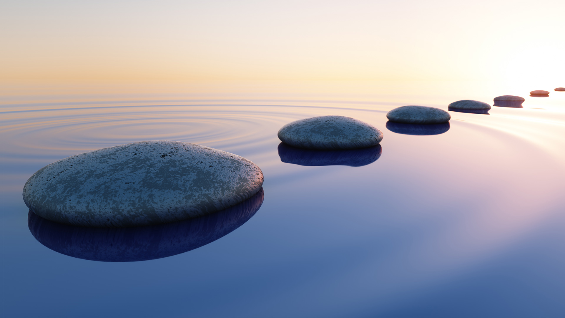 Row of stones on still water, relaxing concept