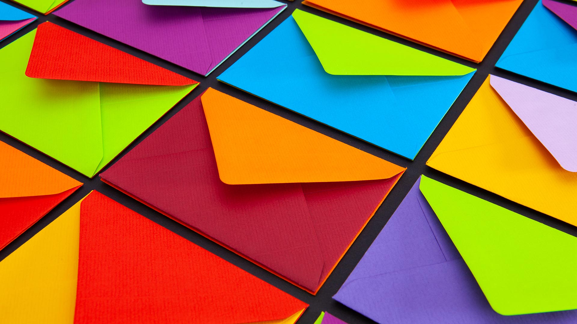 Colourful envelopes laid out neatly