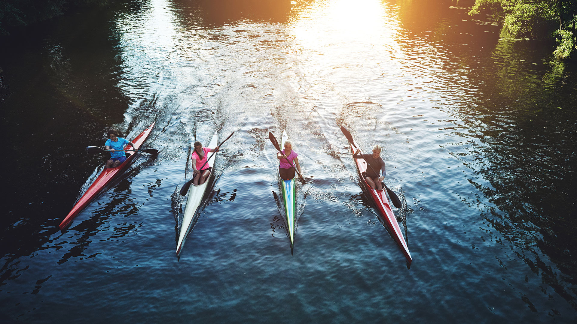 Team of people rowing