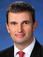 Portrait of Simon Jones, Managing Director, Head of Corporate Sales, Treasury Services – EMEA, J.P. Morgan