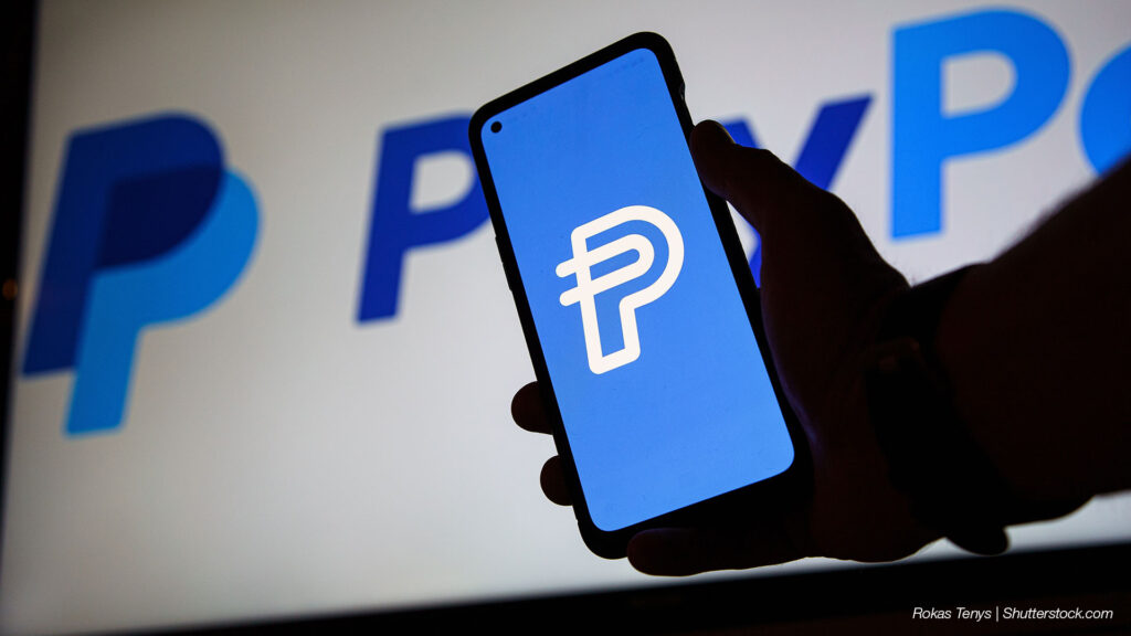PayPal's stablecoin logo on mobile device