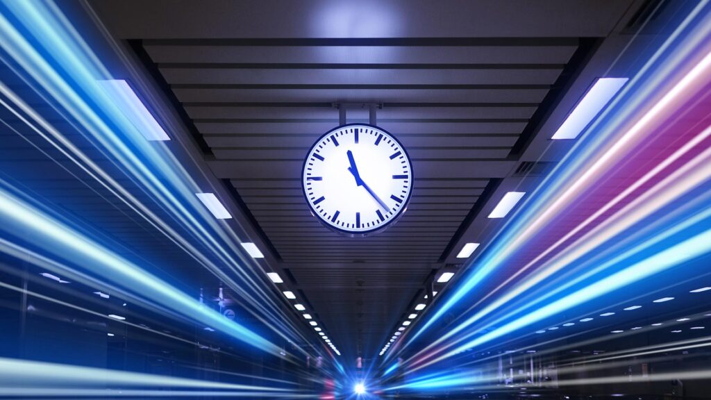 Big clock as train station with light trails