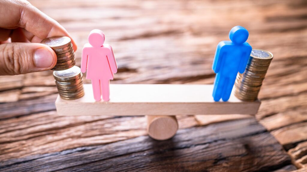 Equal pay concept with man and woman on seesaw, balancing with money