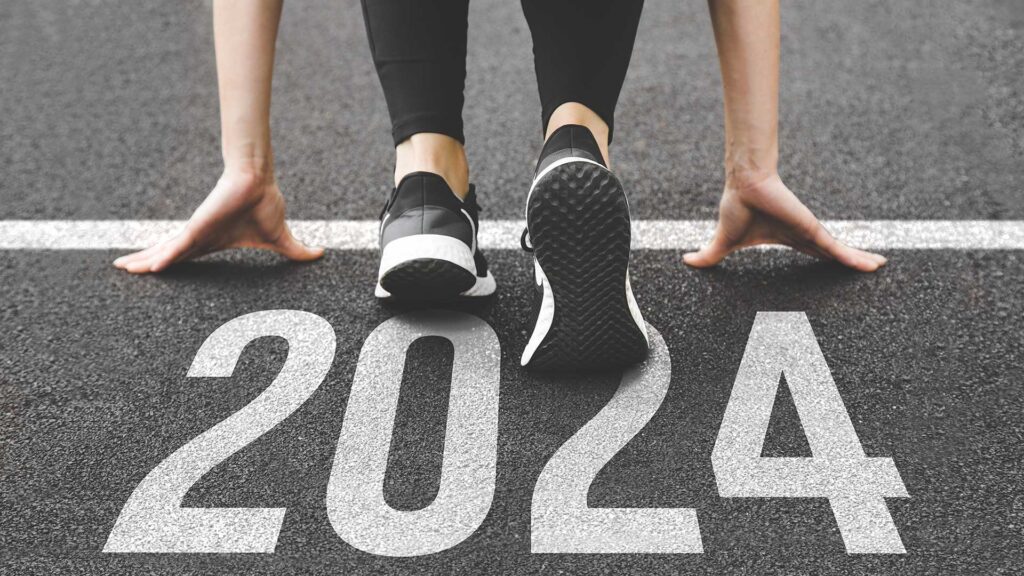 Person getting ready to run with 2024 on the ground