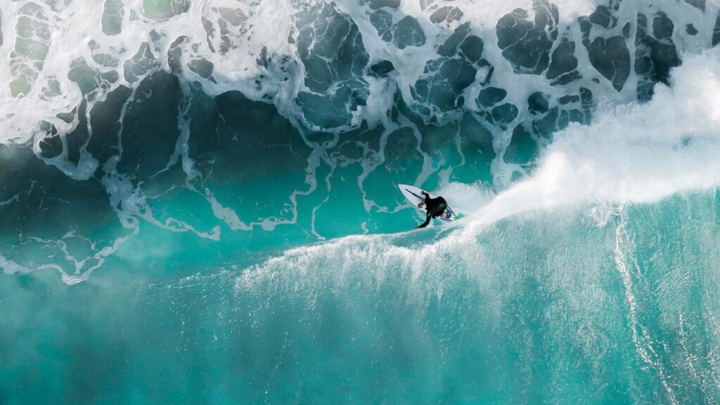 Aerial photo of surfer on the sea