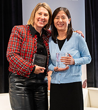 Christina Easton and Gladys Jin with their awards