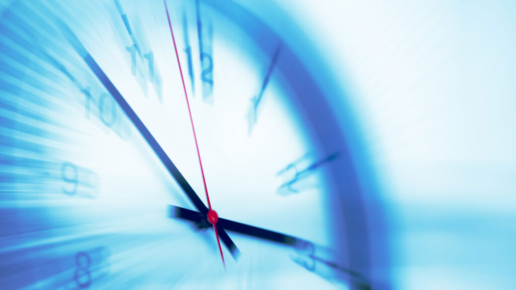 Blurred clock symbolising fast time