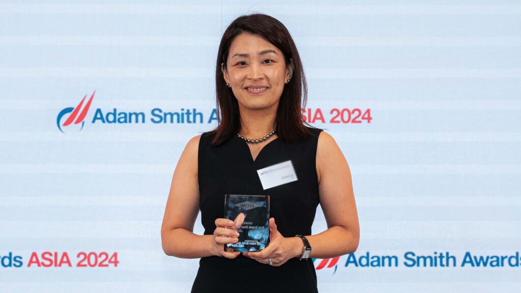 Photo of Jolene Liu, Citi collects the award on behalf of Dow Chemical (China) Investment Co Ltd.