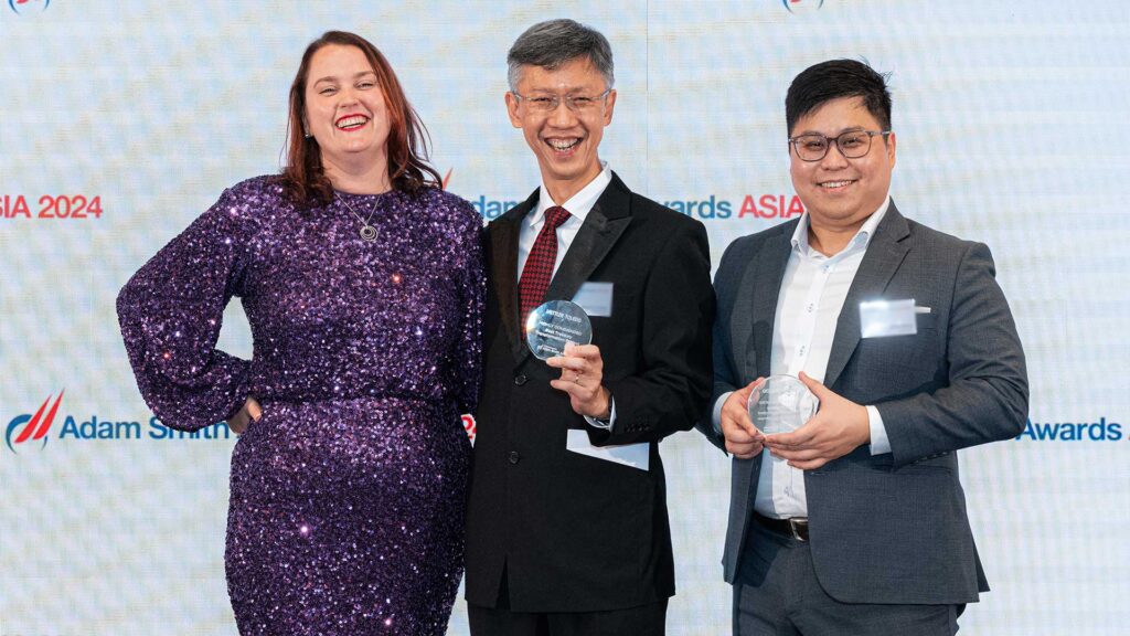 Photo of Sophie Jackson, Treasury Today Group, Raymond Chua, Mettler-Toledo and Melvin Wong, J.P. Morgan.