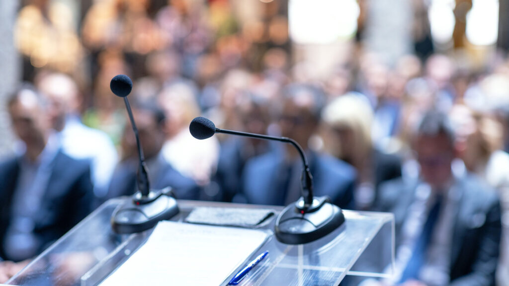 Microphone in focus during a conference