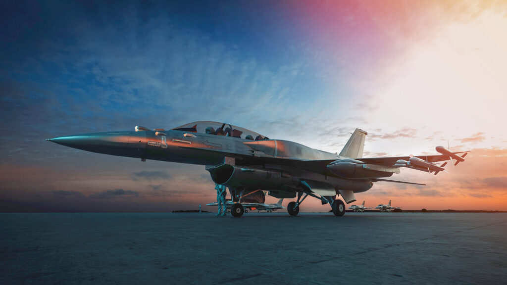 Military jet aircraft parked on the runway