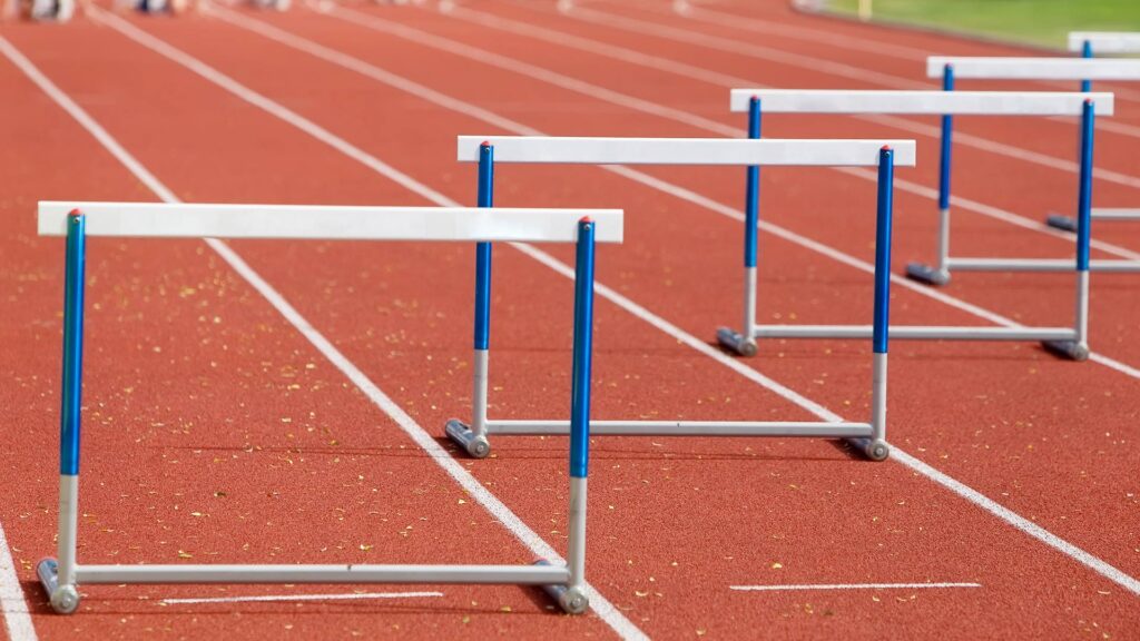 Hurdles lined up on track.