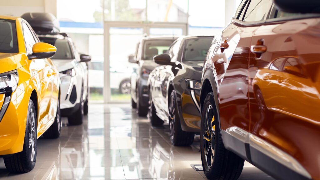 Cars lined up in a showroom