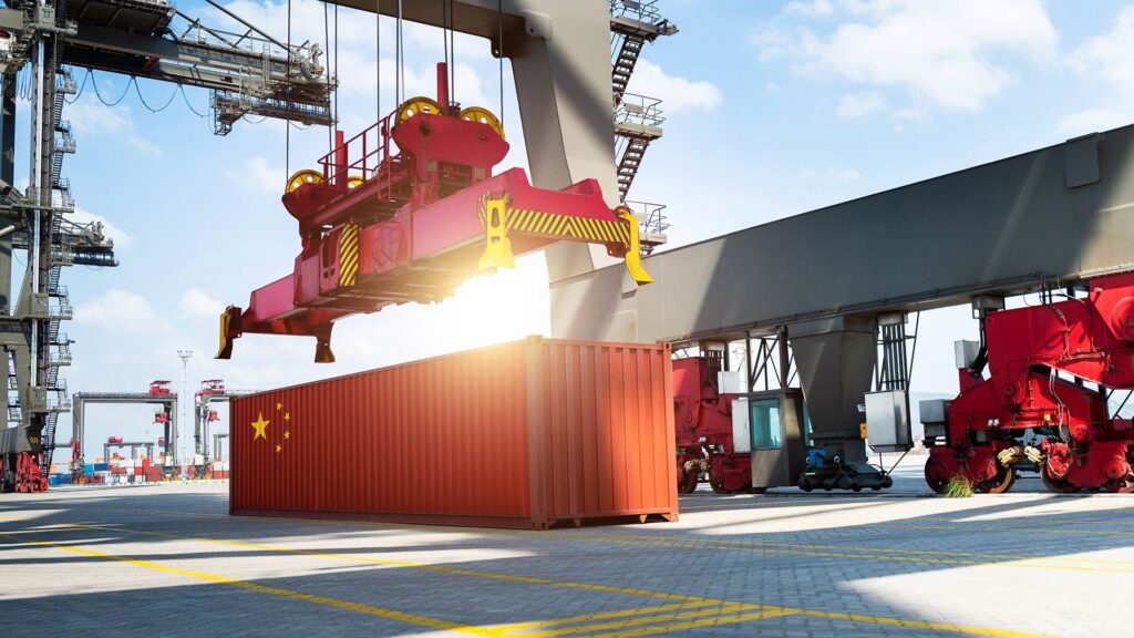 Photo of crane picking up Chinese container.