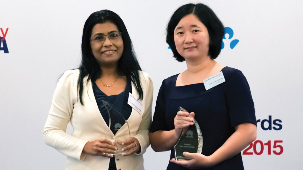 Photo of Shyamasri Dassharma, Deutsche Bank and Dora Pan, PT Huawei Tech Investment (Indonesia).