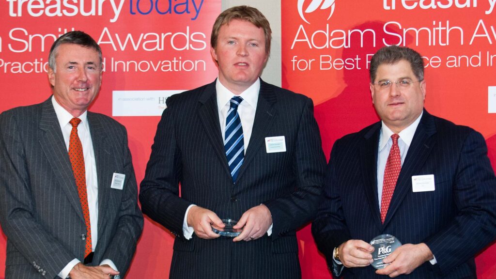 Photo of Richard Parkinson, Andrew Sneddon from Procter & Gamble accepting on behalf of Patricia Ana Remula and Michael Guralnick, Citi.