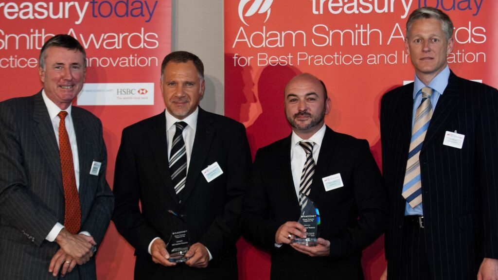 Photo of Richard Parkinson, Alexandre Simon, Thierry Kreins, Flagstone Re and Paul Wheeler, Wall Street Systems.