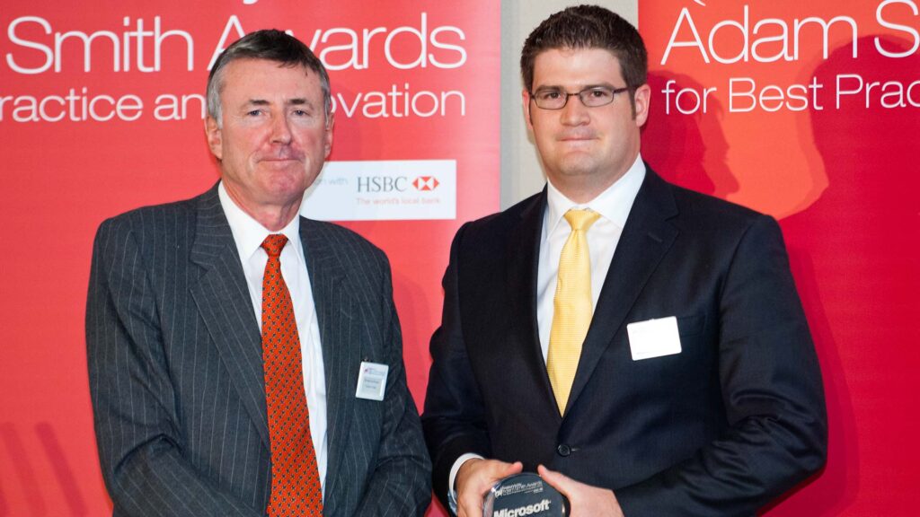 Photo of Richard Parkinson and Bart Wenstrom from Microsoft collecting on behalf of Stephanie Alston.