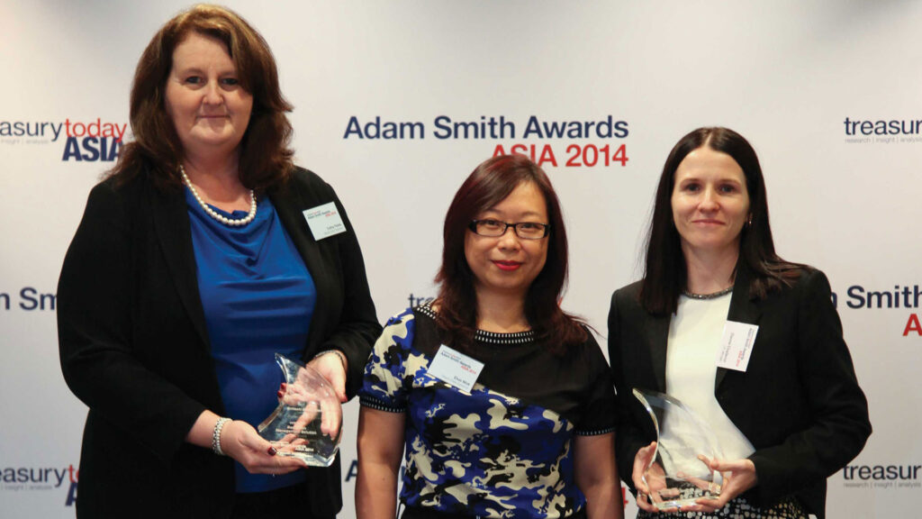 Photo of Cathy Fields and Elsie Mok, Hitachi Data Systems Corporation and Dianne Challenor, J.P. Morgan.