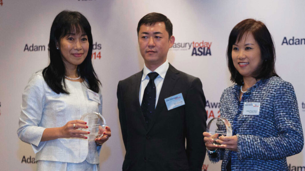 Photo of Chew Puay-Hoon and Taro Nozawa, Dimension Data Holdings with Minako Stryer of J.P. Morgan.