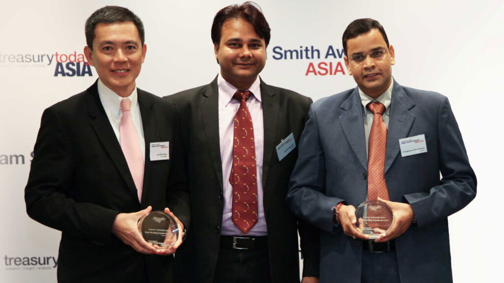 Photo of Pradyumna Maheshwari and Sushil Burnwal of Mosaic India and Lim Kiat Seng of J.P. Morgan.