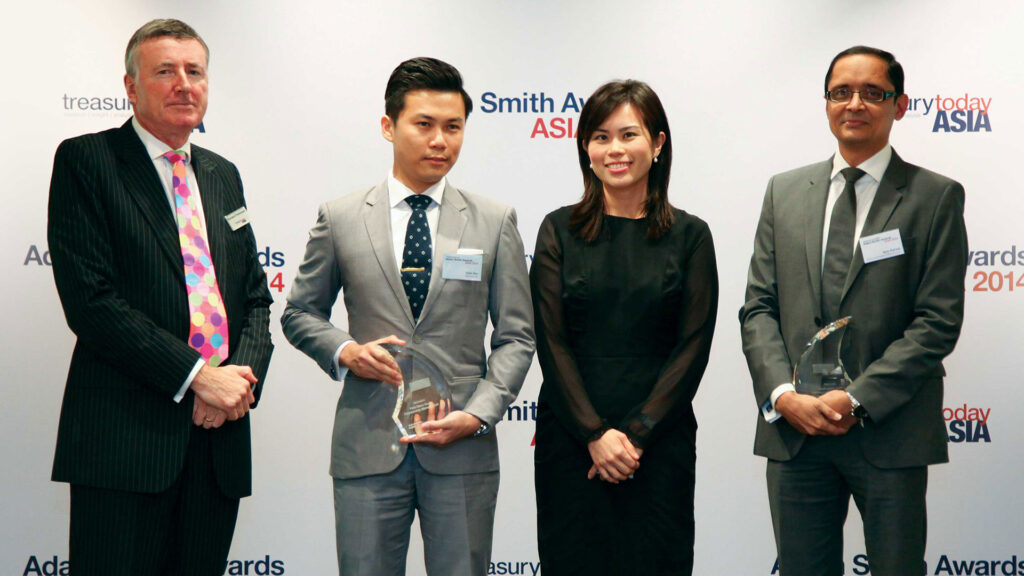 Photo of Alan Ow and Jun Tan of Blackstone and Aziz Parvez of Bank of America Merrill Lynch.