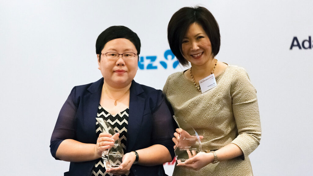 Photo of Tian Yue, Freescale Semiconductor, Christine Tan, J.P. Morgan.