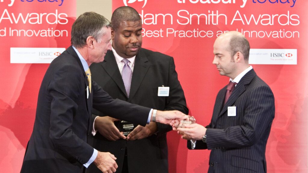 Photo of Richard Parkinson, Richard Nelson from Toyota accepting on behalf of Stephen Howard and Roland Broecheler, RBS.