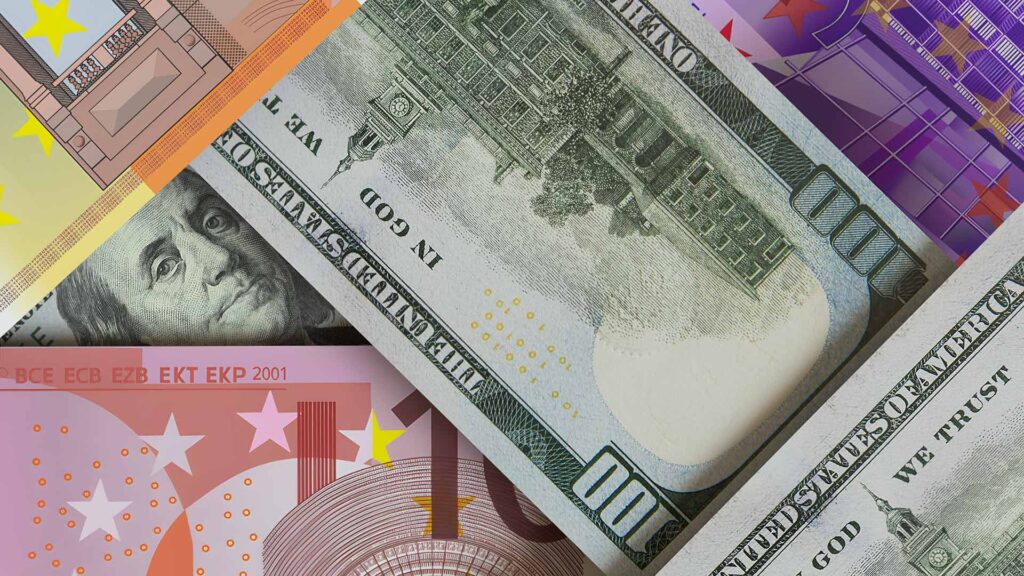 Euro and US dollar notes arranged as shapes.