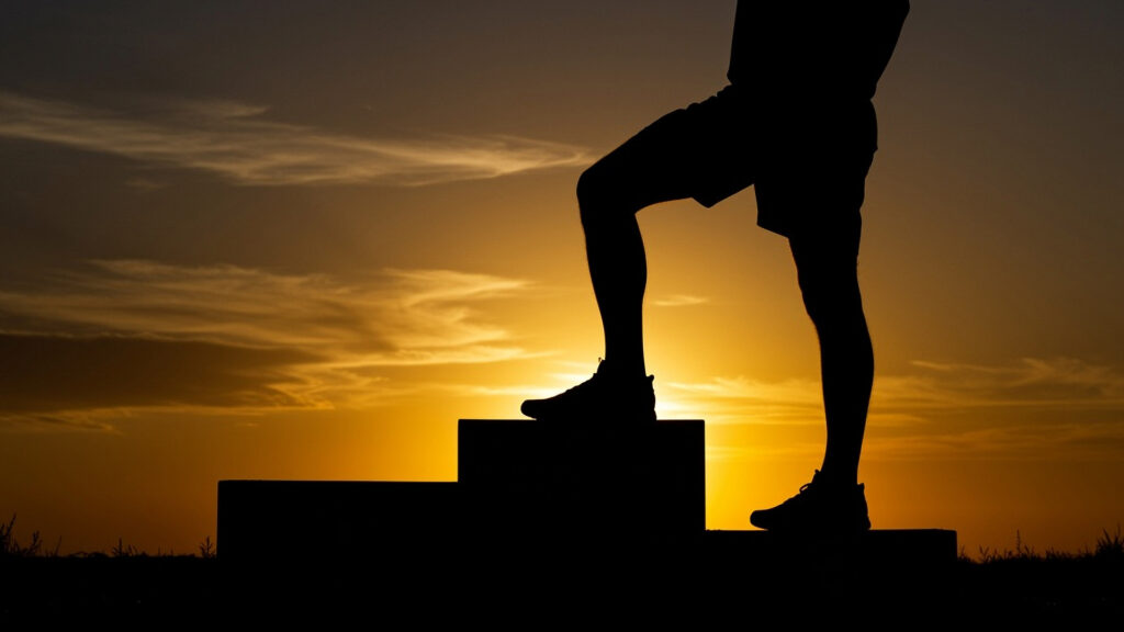 Stepping on podium with sunset.