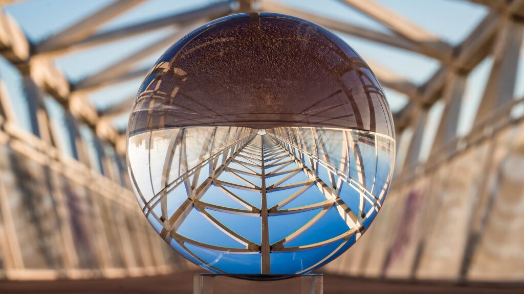 Crystal ball reflecting bridge upside down
