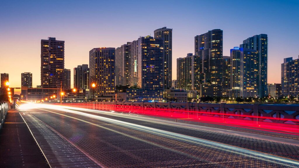 Miami city skyline with fast moving traffic