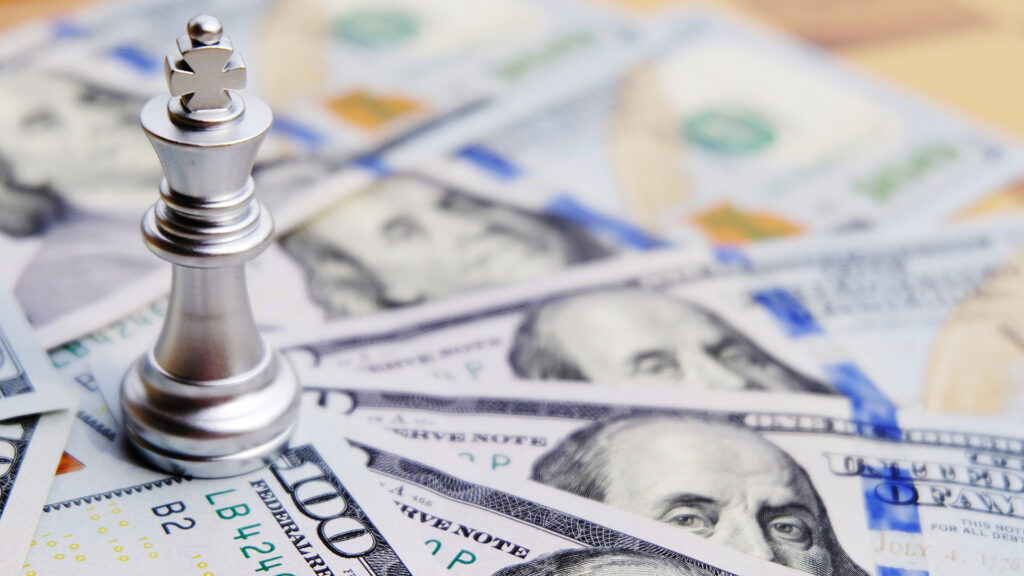 King chess piece on cash.